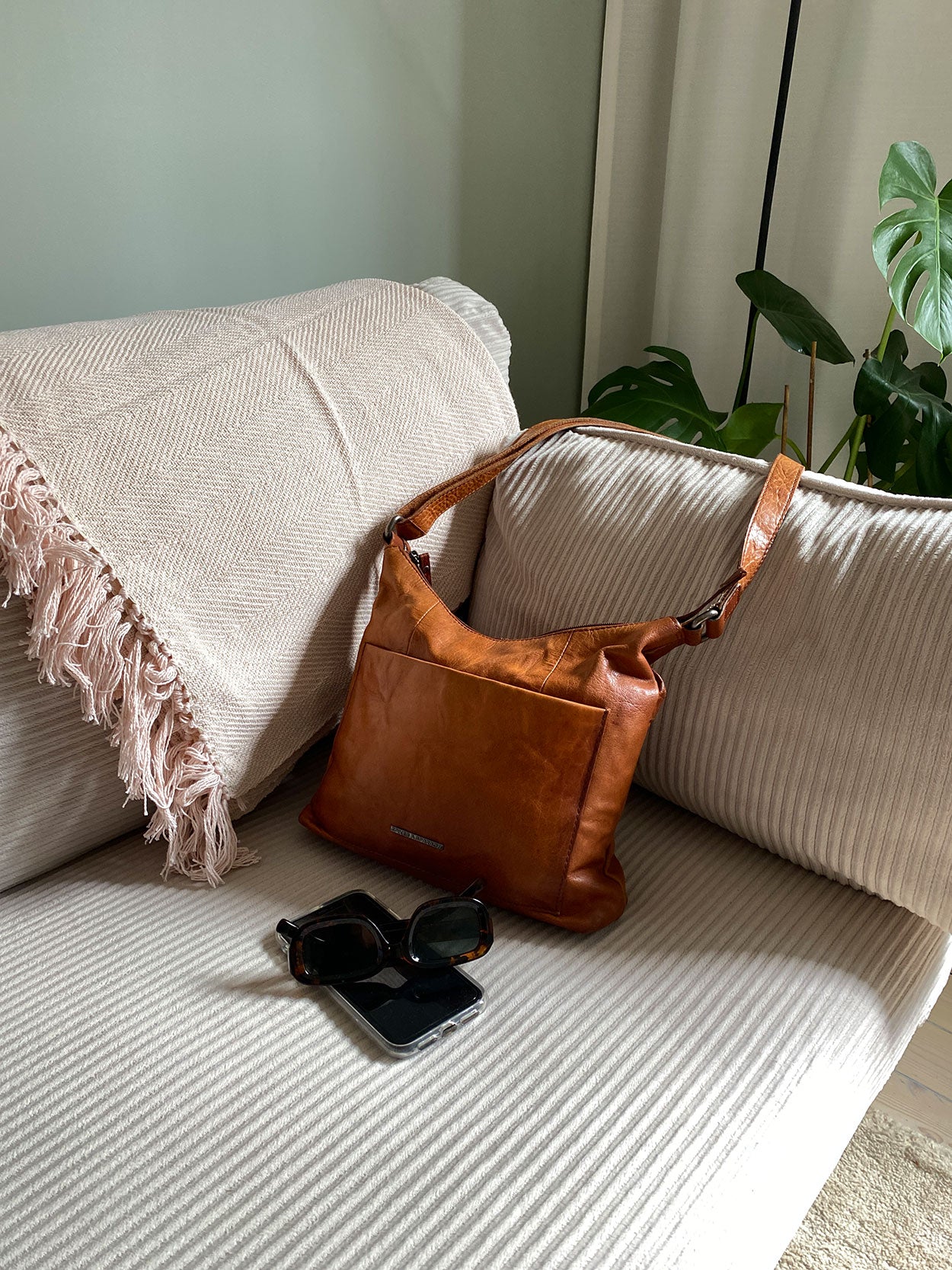 Rosa pläd med struktur av fiskben från Etol Design