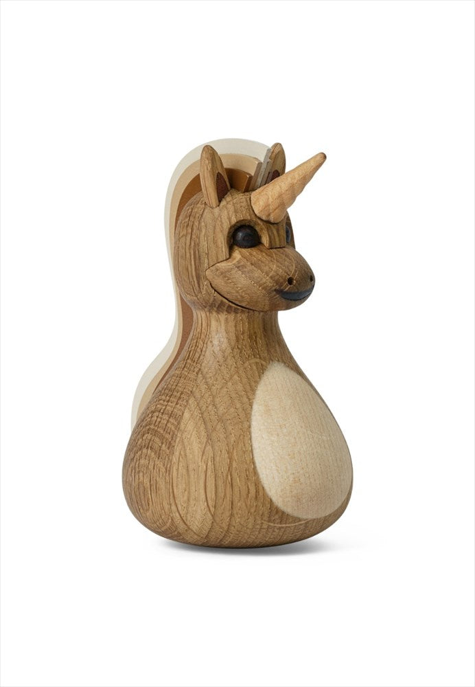 Svarvad enhörning i ljus ek och mörk mahogny för fönsterbänken